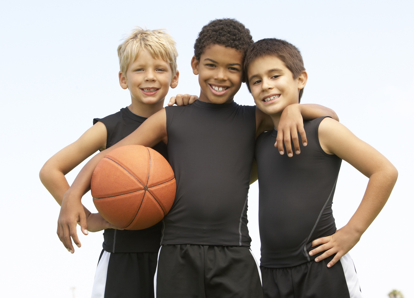 Young Boy Playing Basketball